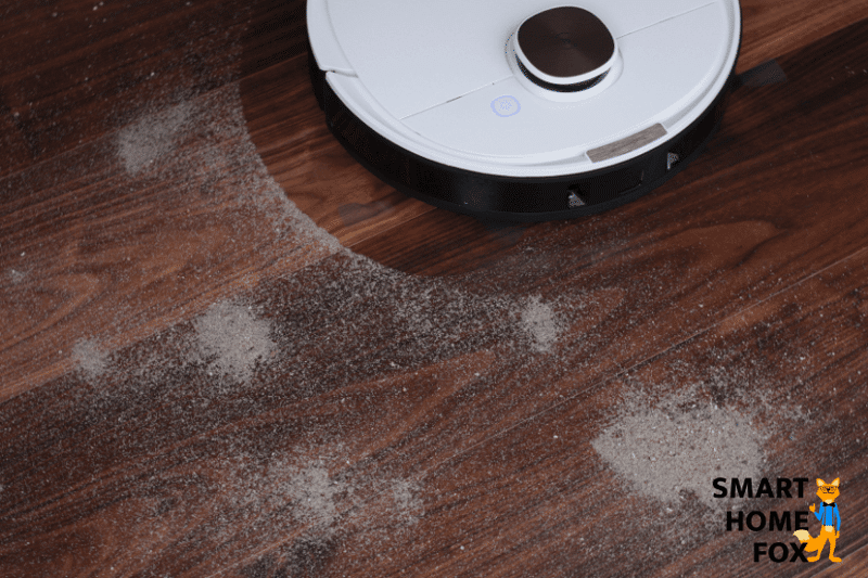 Ecovacs Deebot OZMO T8 during the sand suction test on laminate flooring